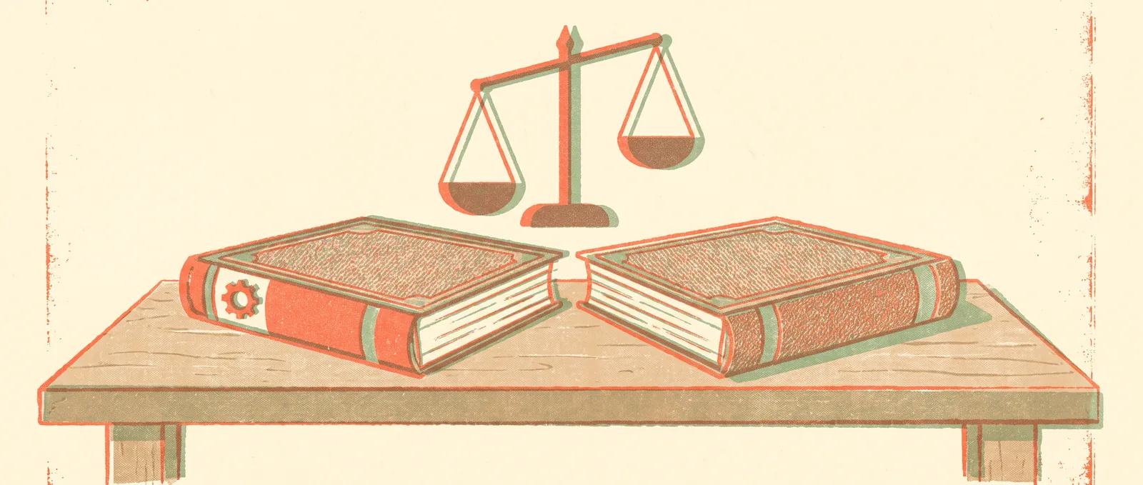 Two nearly identical books lying open on a table, one spine marked with a small gear, a balance scale tipping above them