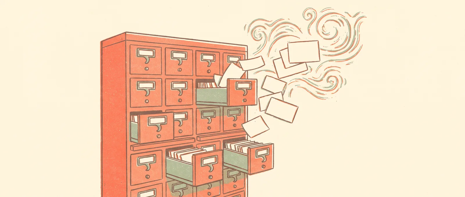 Un catalogo a schede di una biblioteca con i cassetti aperti e svuotati, schede bianche che andavano su e giù