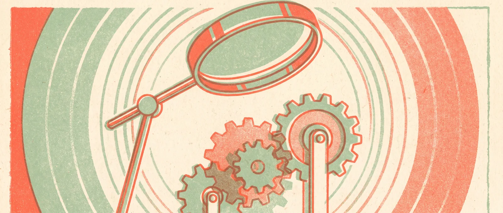 A magnifying lens on a stand angled over a group of interlocking cogwheels, one held still by an upright bar