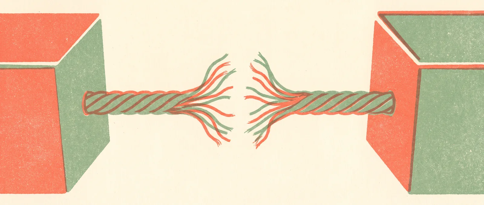 A thick braided cable running between two heavy blocks, cleanly severed in the middle with strands fraying outward